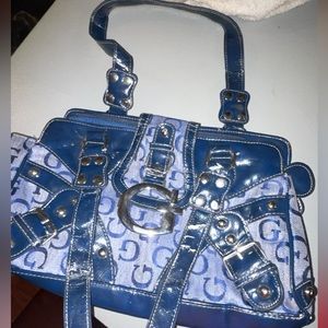 Idk what brand, dark blue purse